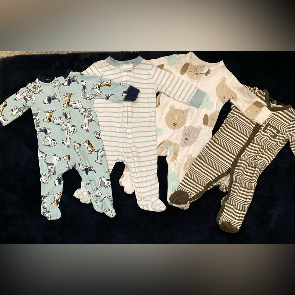 Long sleeved sleep and play bundle.  Carter’s 6 mo. & Guess